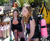 Melissa and Jennifer preparing for SCUBA lessons in the Caribbean