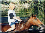 Jenn & her horse Cochise swimming Green River